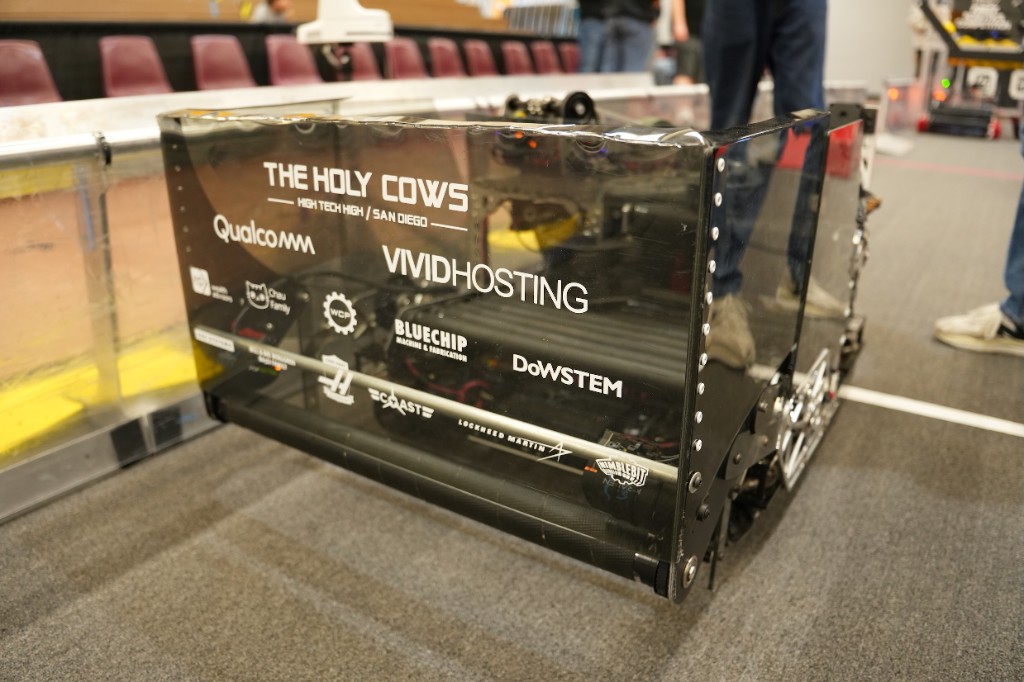 Daisy-Saurus bumper displaying team and sponsor branding