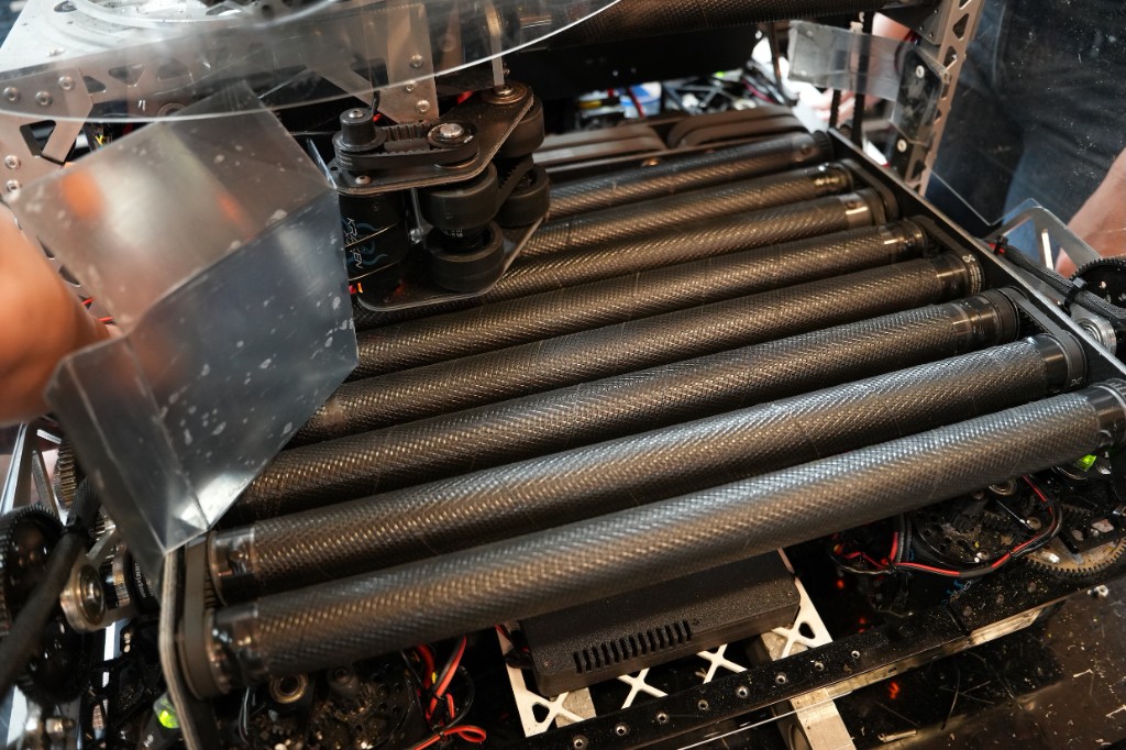 Detail view of the carbon fiber roller system inside the hopper
